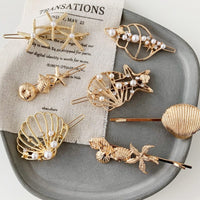 Gold sea shell hair clips – Luxury hair accessory for women